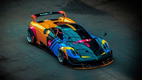 Vibrant Pagani Racer Combining Art and Speed wallpaper