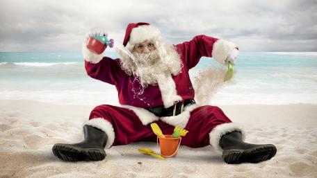 Funny Santa on the beach wallpaper