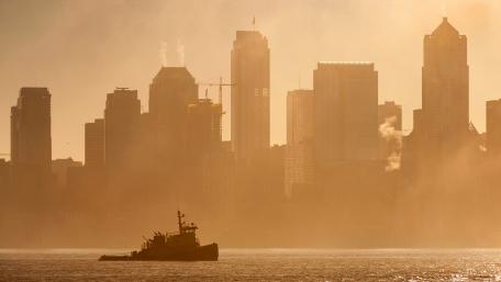 Golden Haze Over a Vibrant Metropolis wallpaper