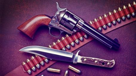 Revolver and Knife on Display wallpaper