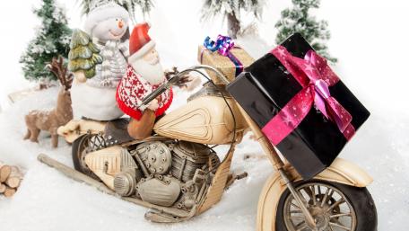 Santa Calus on snowmobile wallpaper