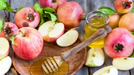 Pomegranates, apples and honey wallpaper
