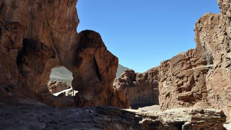 Majestic Natural Arch in Badlands Scene wallpaper