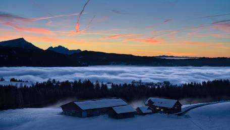 Serene Winter Landscape Above the Clouds wallpaper