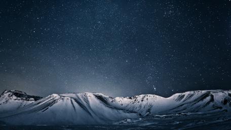 Starry Night Over Winter Peaks wallpaper