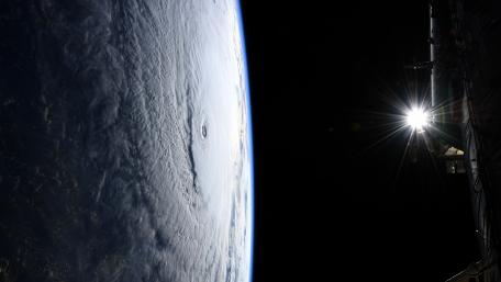 Space Station Flight Over Hurricane Lane wallpaper