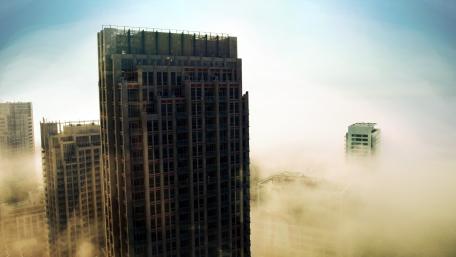 Old buildings above the fog wallpaper
