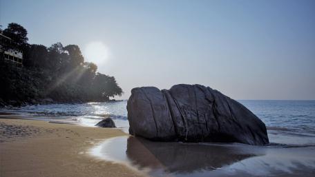 Serene Beach Rock at Sunset wallpaper