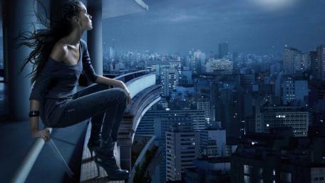 Midnight Dreams Above the Cityscape wallpaper