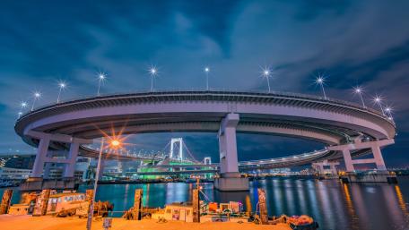 Rainbow Bridge curving over bay to Odaiba Japan wallpaper