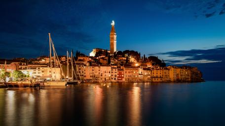 Enchanting Night View of Coastal Town wallpaper