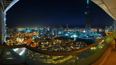 Balcony view of Dubai at night wallpaper