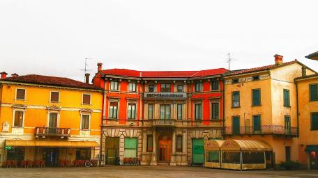 Charming City Square Under Soft Skies wallpaper