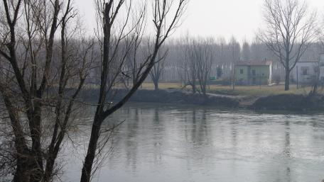 Tranquil River Scene in Early Morning Mist wallpaper