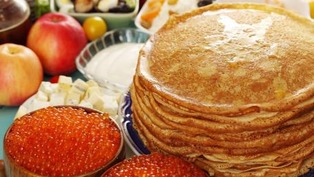 Delicious Russian Bliny Stack with Toppings wallpaper