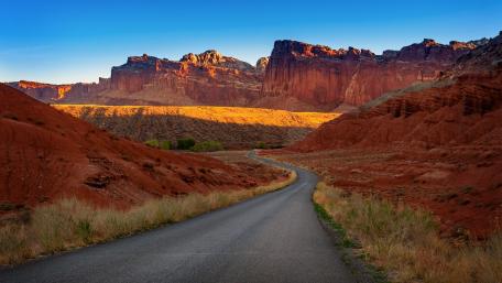 Winding Road Through Stunning Badlands Landscape wallpaper