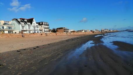 Serene Coastal Escape with Charming Beach Houses wallpaper