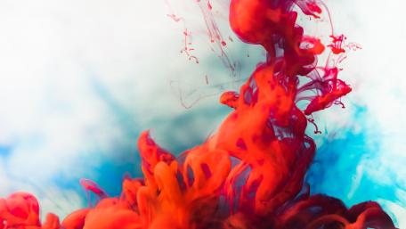 Red ink in water wallpaper