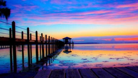 Serene Sunset Pier Escape wallpaper