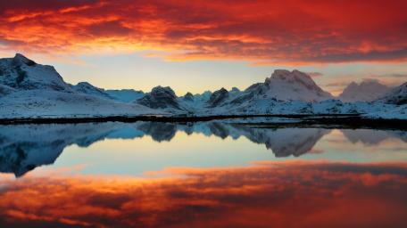 Majestic Winter Landscape Reflection in Colorful Sky wallpaper