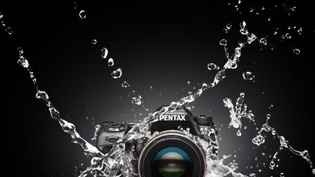 Dynamic Splash of Creativity with a Camera wallpaper
