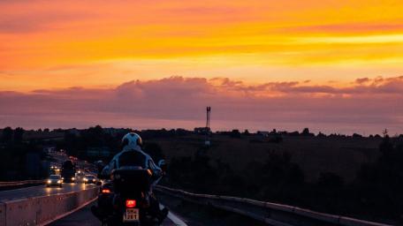 Rider's Journey at Dusk Moments of Freedom and Adventure wallpaper