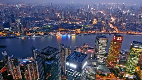 Stunning Metropolis Skyline Over River View at Dusk wallpaper