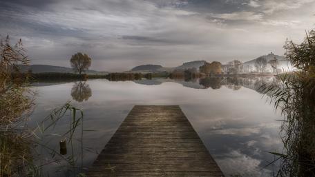 Tranquil Lake and Dock Reflections wallpaper