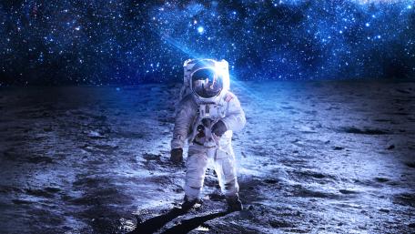 Astronaut on a planet surface wallpaper