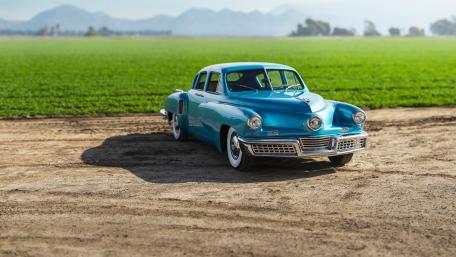 Vintage Blue Classic Car in Open Field wallpaper