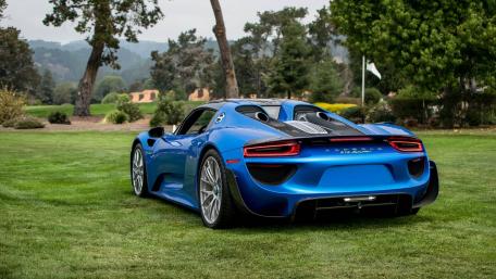 Blue Supercar Elegance on Grass wallpaper
