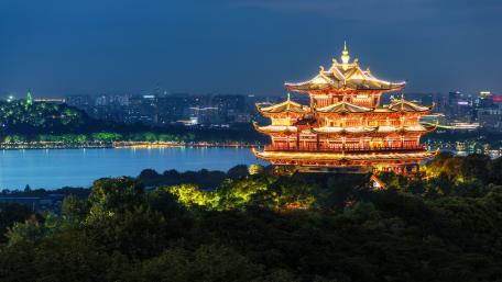 Pagoda Illuminated at Night in China wallpaper