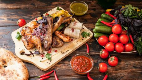 Grilled Delights on a Wooden Platter for Food Lovers wallpaper