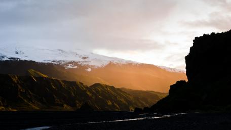 Majestic Highland Sunrise Over Mountains wallpaper