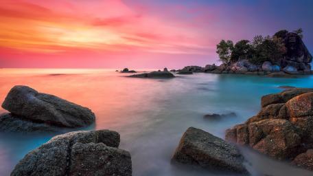 Boulders on the seashore wallpaper