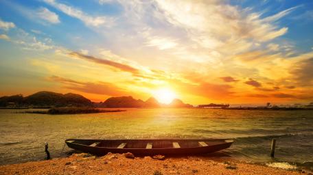 Boat in the sunset wallpaper