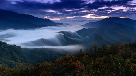 Mysterious Mountain Fogscape in 4K wallpaper
