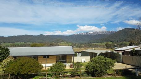 Scenic Mountain View Over Townhouse Landscape wallpaper