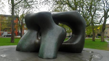 Modern Sculpture in Urban Park Setting wallpaper