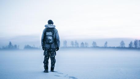 Lone man with backpack wallpaper