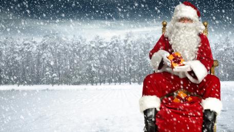 Santa Claus in the snowfall wallpaper