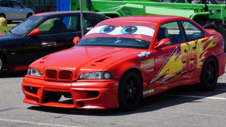 Racing Red BMW with Cartoon Eyes wallpaper