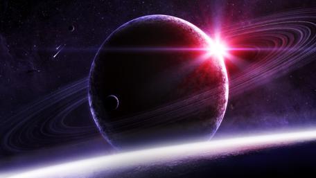 Mystical Planet with Stunning Rings and Light Burst wallpaper