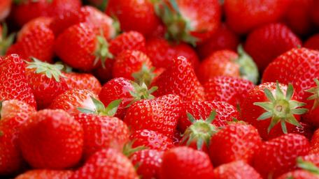 Fresh and Juicy Strawberries Gathered Together wallpaper