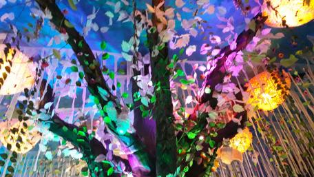 Vibrant Artistic Tree with Colorful Leaves and Lights wallpaper