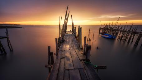 Purple sunset from a jetty wallpaper