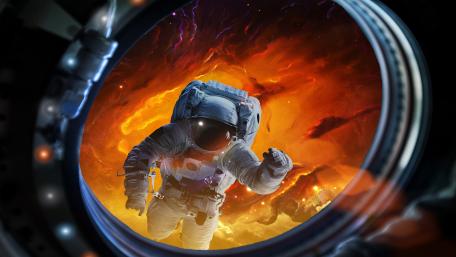 Astronaut Gazing into the Cosmic Inferno wallpaper
