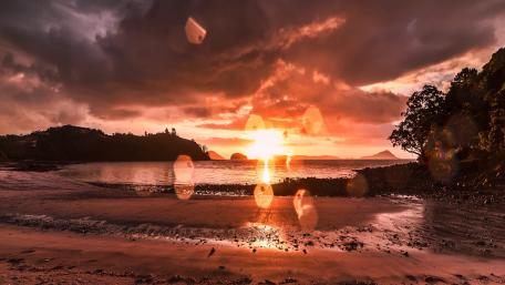 Sunset from the beach in New Zealand wallpaper