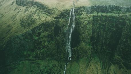 Majestic Waterfall in Green Valley wallpaper