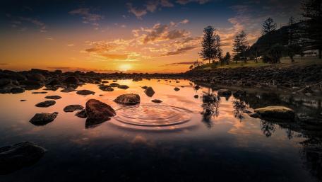 Serene Sunset Over Tranquil Waters wallpaper